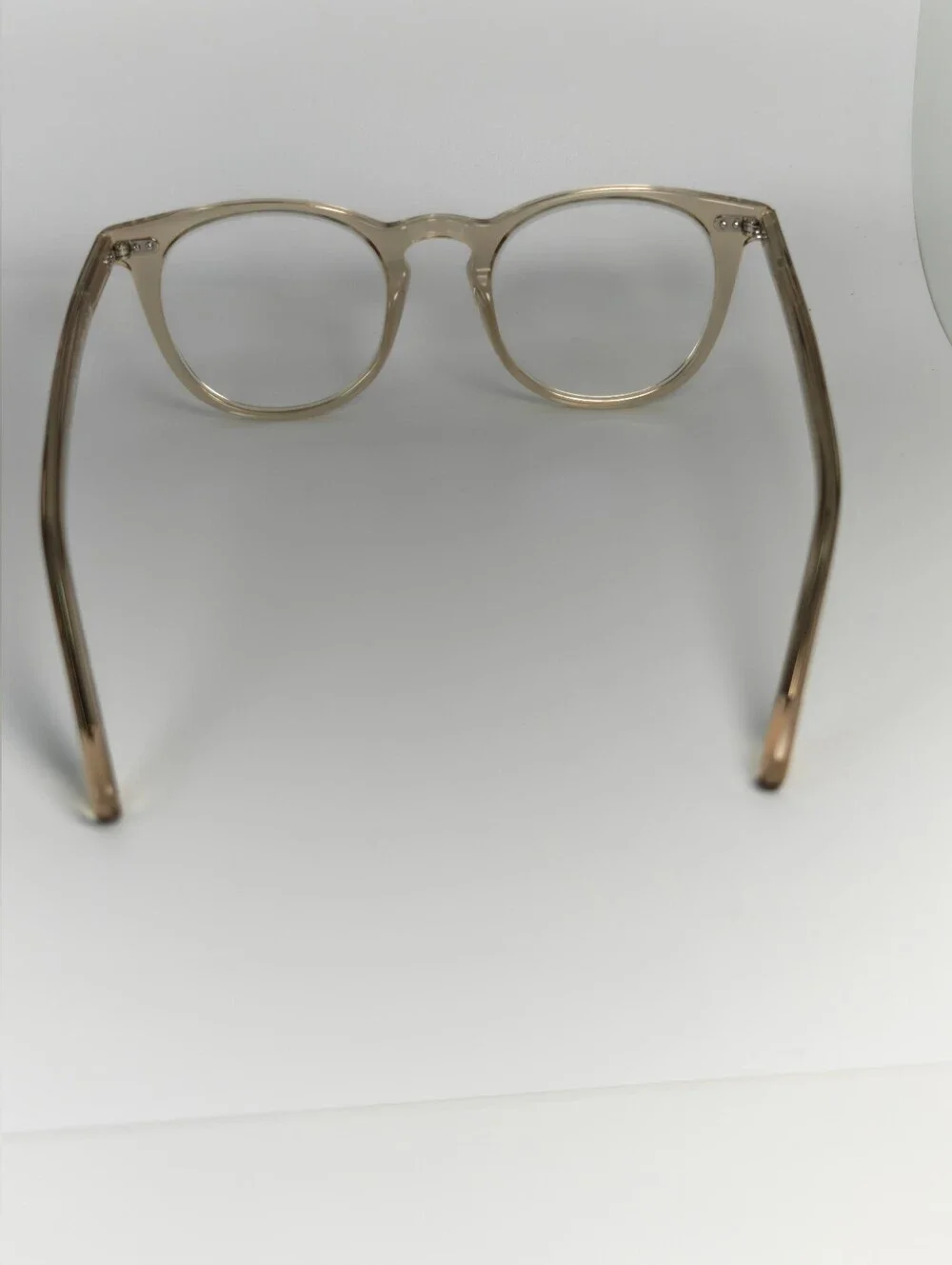 Ona. RFLKT. Clear Beige Round Frame Glasses.